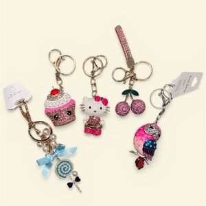 Set a five adorable keychains/ bag charms all brand new